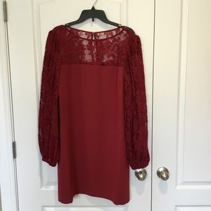 Burgundy long sleeve mini dress with lace details